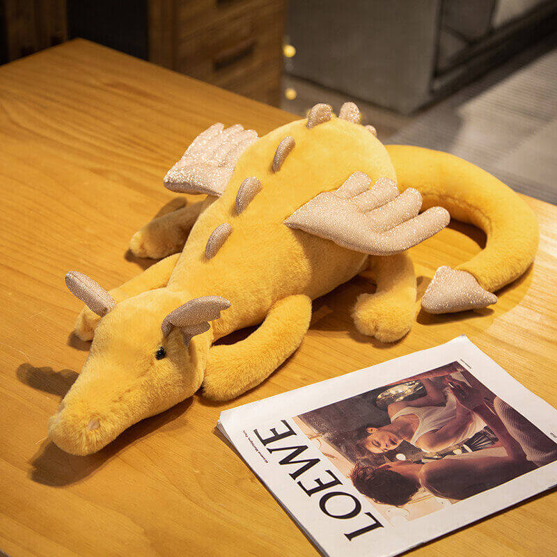 Adorable yellow dragon plush doll perfect for toddlers, babies, and children, adding whimsy to playtime or decor.