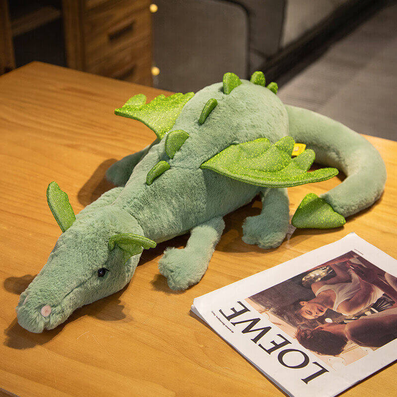 Soft green dragon plush doll with wings perfect for toddlers, babies, and children, ideal for cuddles and play.